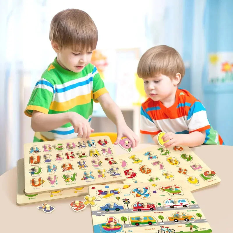 Children grasping wooden peg pieces beside colorful alphabet, number and vehicle puzzle boards