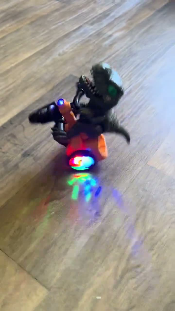 Actual dinosaur tricycle with its front wheel raised during a spin
