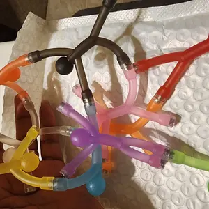 Customer photo of translucent magnetic figures linked together on packaging.